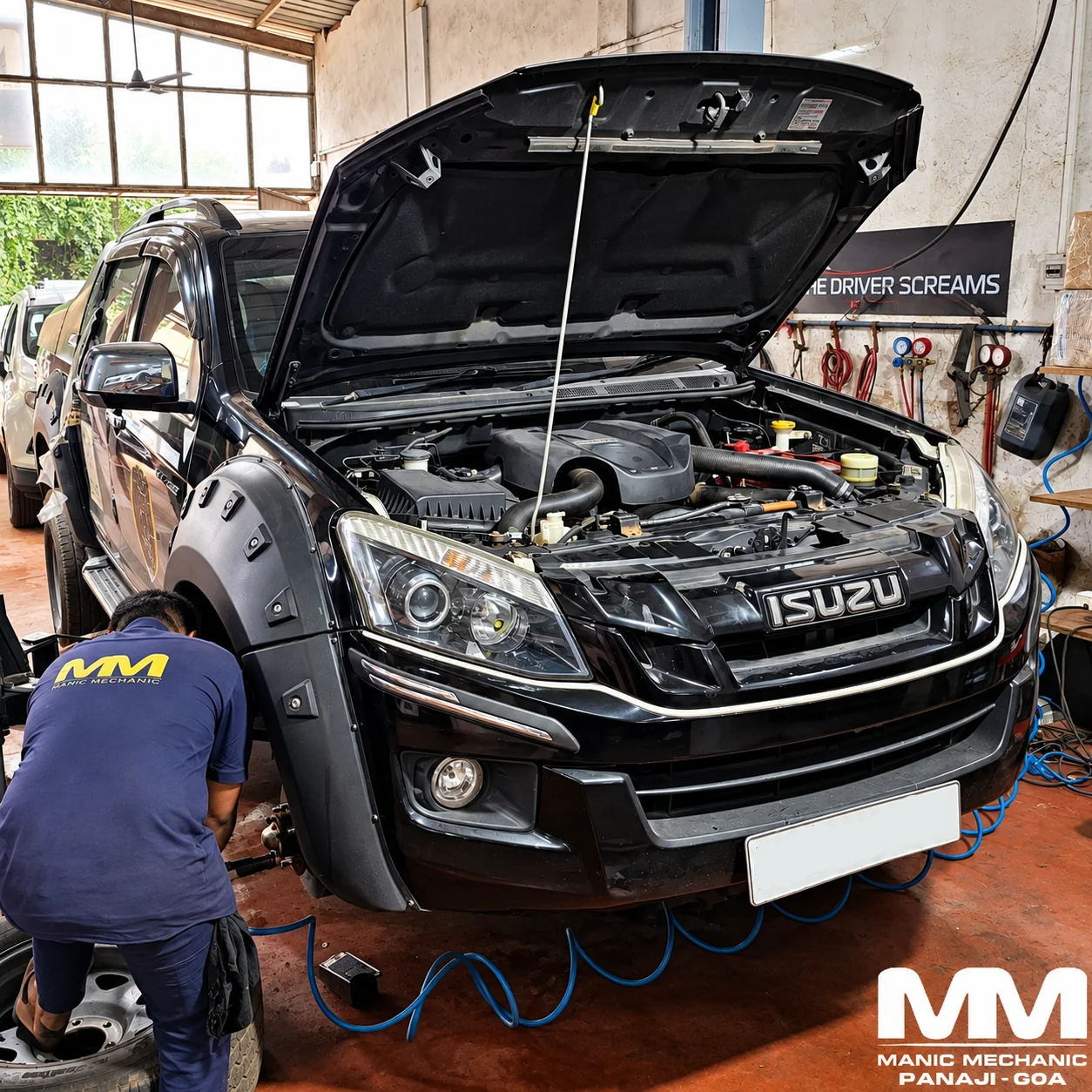 Isuzu V-Cross receiving annual service at Manic Mechanic Goa